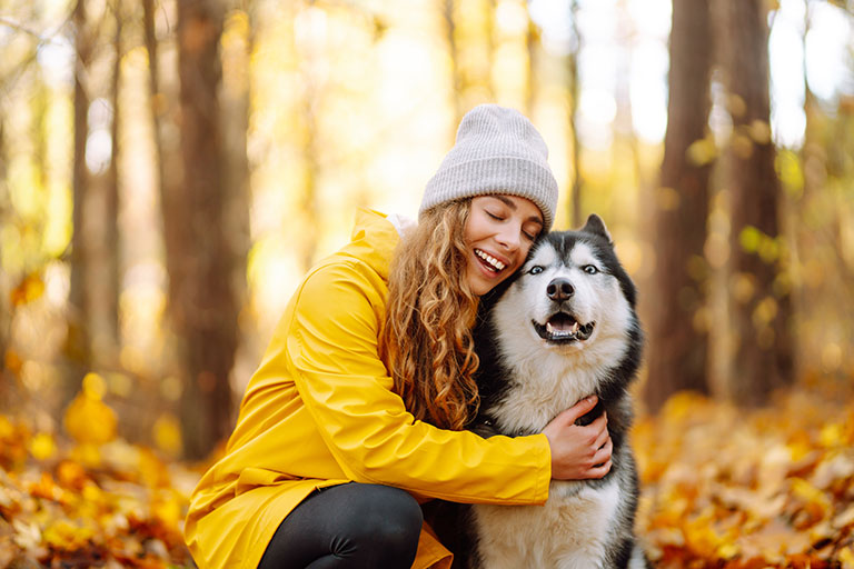 Woman With Husky